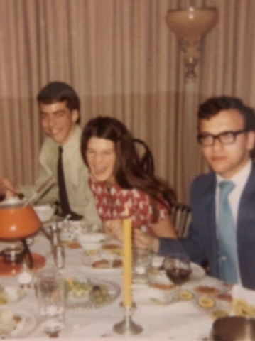 Fondue party at Mary Carol Reichlins. Left to right Gary Schmidt, Kathy Sholtis and Joe Demarco. May 1970